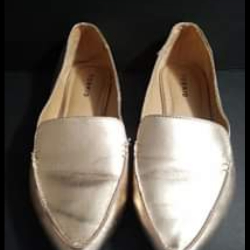 Rose gold flats.
